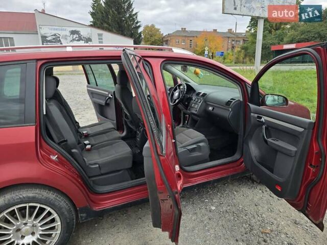 Червоний Фольксваген Туран, об'ємом двигуна 1.97 л та пробігом 387 тис. км за 4900 $, фото 14 на Automoto.ua