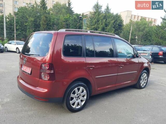 Красный Фольксваген Туран, объемом двигателя 1.4 л и пробегом 254 тыс. км за 6999 $, фото 9 на Automoto.ua
