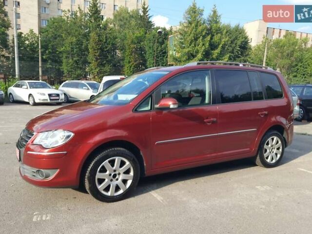 Красный Фольксваген Туран, объемом двигателя 1.4 л и пробегом 254 тыс. км за 6999 $, фото 46 на Automoto.ua