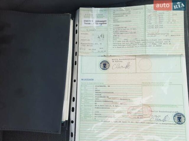 Красный Фольксваген Туран, объемом двигателя 1.4 л и пробегом 254 тыс. км за 6999 $, фото 45 на Automoto.ua