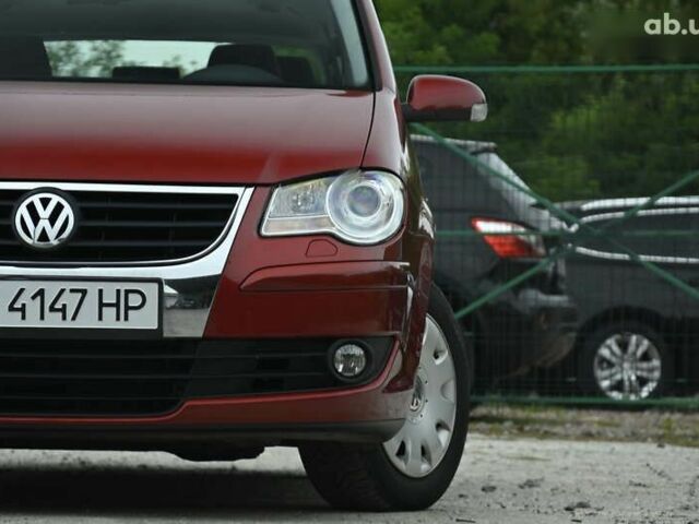 Красный Фольксваген Туран, объемом двигателя 1.4 л и пробегом 193 тыс. км за 6500 $, фото 6 на Automoto.ua