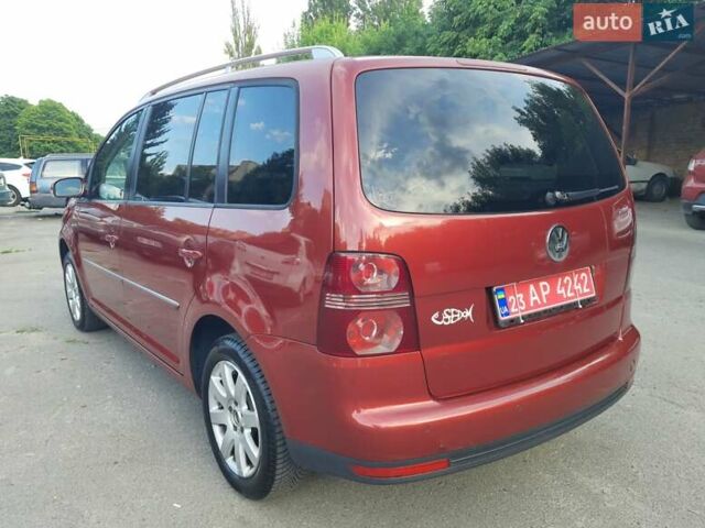 Красный Фольксваген Туран, объемом двигателя 1.4 л и пробегом 254 тыс. км за 6999 $, фото 6 на Automoto.ua