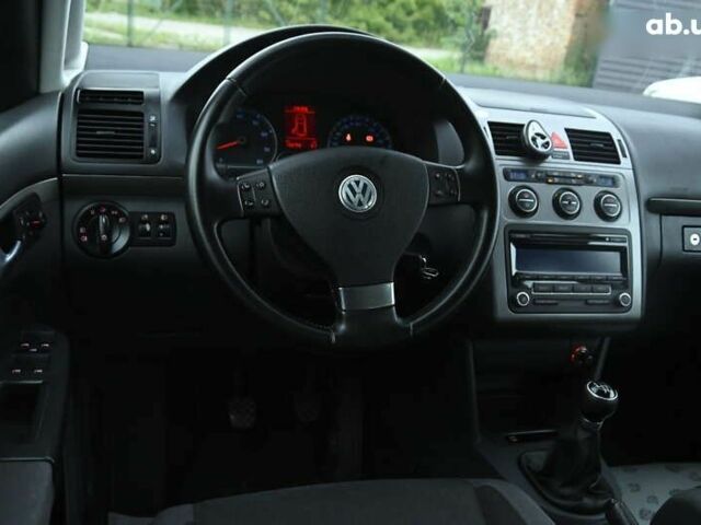 Красный Фольксваген Туран, объемом двигателя 1.4 л и пробегом 193 тыс. км за 6500 $, фото 24 на Automoto.ua