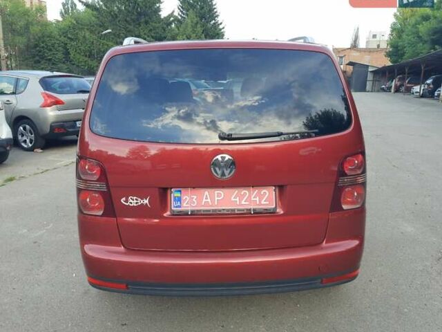 Красный Фольксваген Туран, объемом двигателя 1.4 л и пробегом 254 тыс. км за 6999 $, фото 7 на Automoto.ua