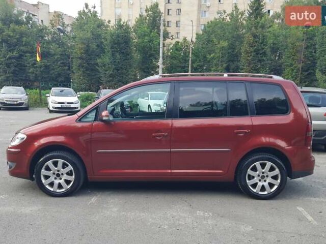 Красный Фольксваген Туран, объемом двигателя 1.4 л и пробегом 254 тыс. км за 6999 $, фото 3 на Automoto.ua