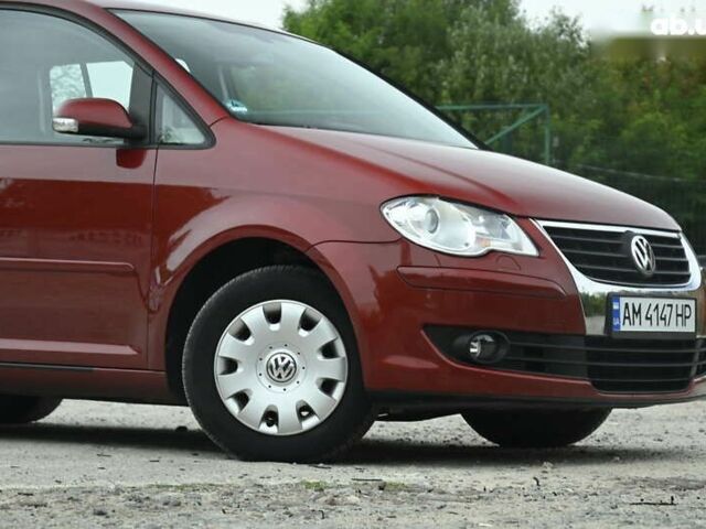 Красный Фольксваген Туран, объемом двигателя 1.4 л и пробегом 193 тыс. км за 6500 $, фото 2 на Automoto.ua
