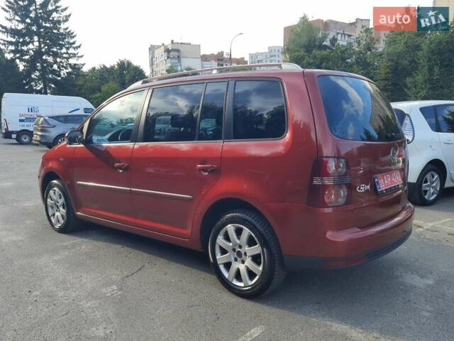 Красный Фольксваген Туран, объемом двигателя 1.4 л и пробегом 254 тыс. км за 6999 $, фото 5 на Automoto.ua