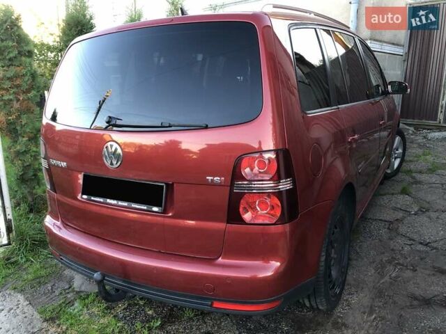 Червоний Фольксваген Туран, об'ємом двигуна 1.4 л та пробігом 241 тис. км за 7300 $, фото 4 на Automoto.ua