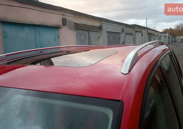 Красный Фольксваген Туран, объемом двигателя 1.39 л и пробегом 250 тыс. км за 6500 $, фото 4 на Automoto.ua