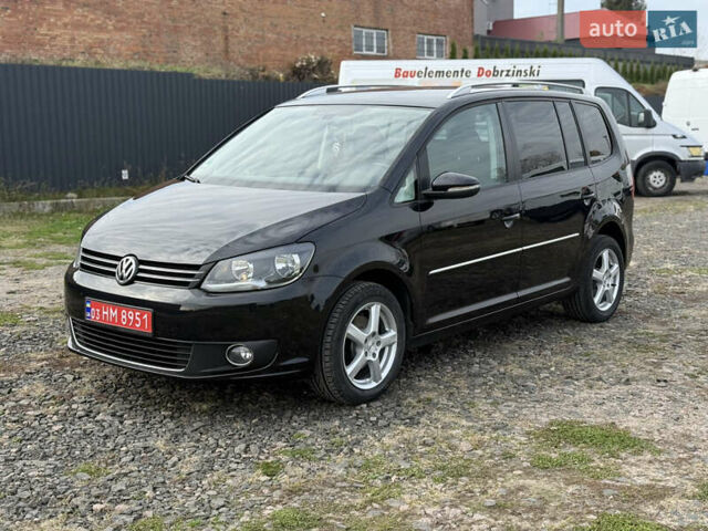 Красный Фольксваген Туран, объемом двигателя 1.6 л и пробегом 210 тыс. км за 10600 $, фото 4 на Automoto.ua