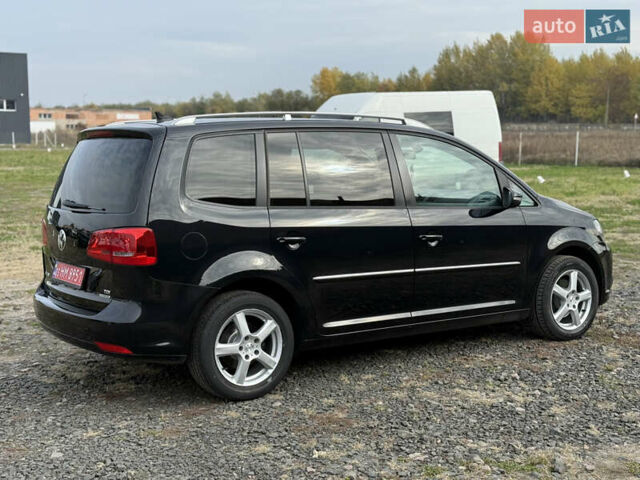 Красный Фольксваген Туран, объемом двигателя 1.6 л и пробегом 210 тыс. км за 10600 $, фото 8 на Automoto.ua