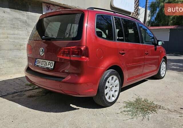 Красный Фольксваген Туран, объемом двигателя 1.6 л и пробегом 262 тыс. км за 8999 $, фото 7 на Automoto.ua