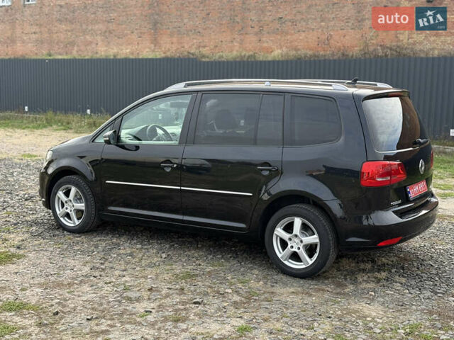 Красный Фольксваген Туран, объемом двигателя 1.6 л и пробегом 210 тыс. км за 10600 $, фото 11 на Automoto.ua