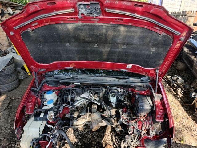 Фольксваген Туран 2004 в Кропивницком (Кировограде) на Automoto.ua Красный Фольксваген Туран, объемом двигателя 2 л и пробегом 360 тыс. км за 3499 $, фото 6 на Automoto.ua