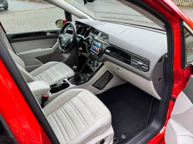 Красный Фольксваген Туран, объемом двигателя 1.4 л и пробегом 72 тыс. км за 9000 $, фото 7 на Automoto.ua