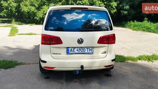 Желтый Фольксваген Туран, объемом двигателя 1.39 л и пробегом 280 тыс. км за 7500 $, фото 5 на Automoto.ua