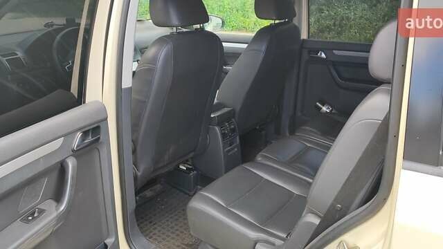 Желтый Фольксваген Туран, объемом двигателя 1.39 л и пробегом 280 тыс. км за 7500 $, фото 2 на Automoto.ua