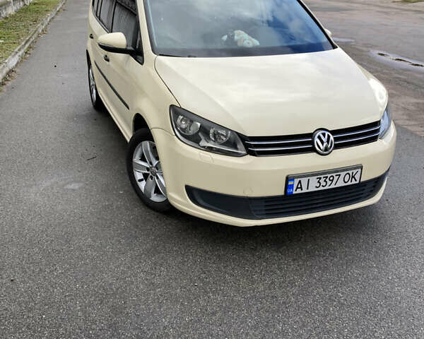 Желтый Фольксваген Туран, объемом двигателя 1.39 л и пробегом 200 тыс. км за 10000 $, фото 21 на Automoto.ua