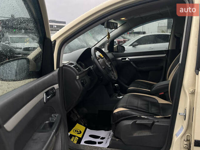 Желтый Фольксваген Туран, объемом двигателя 1.97 л и пробегом 213 тыс. км за 8990 $, фото 16 на Automoto.ua