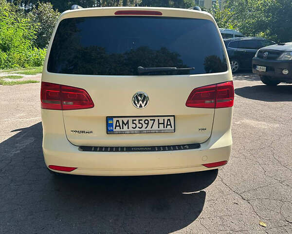 Желтый Фольксваген Туран, объемом двигателя 1.97 л и пробегом 336 тыс. км за 9599 $, фото 11 на Automoto.ua