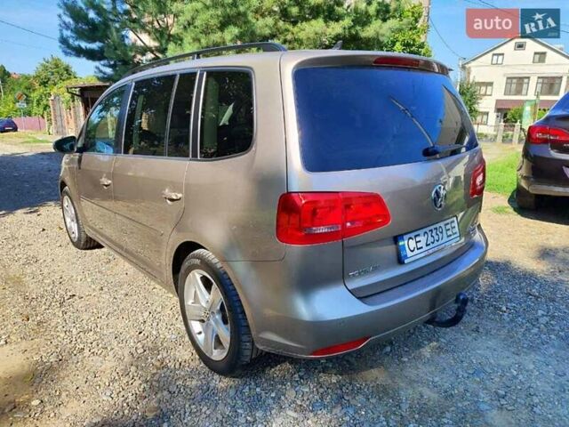 Желтый Фольксваген Туран, объемом двигателя 2 л и пробегом 214 тыс. км за 12500 $, фото 3 на Automoto.ua