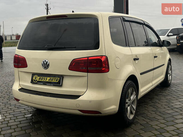 Желтый Фольксваген Туран, объемом двигателя 1.97 л и пробегом 213 тыс. км за 8990 $, фото 6 на Automoto.ua