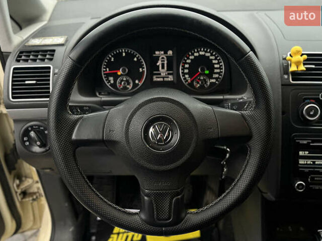 Желтый Фольксваген Туран, объемом двигателя 1.97 л и пробегом 213 тыс. км за 8990 $, фото 9 на Automoto.ua