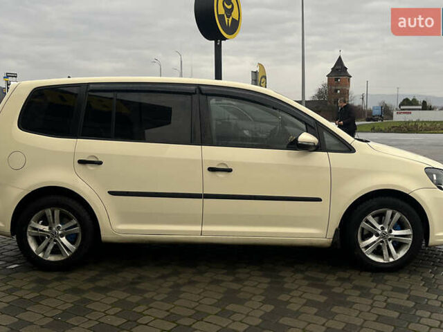 Желтый Фольксваген Туран, объемом двигателя 1.97 л и пробегом 213 тыс. км за 8990 $, фото 7 на Automoto.ua