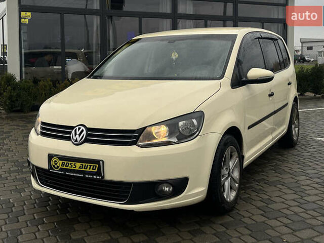 Желтый Фольксваген Туран, объемом двигателя 1.97 л и пробегом 213 тыс. км за 8990 $, фото 2 на Automoto.ua