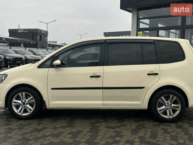 Желтый Фольксваген Туран, объемом двигателя 1.97 л и пробегом 213 тыс. км за 8990 $, фото 3 на Automoto.ua