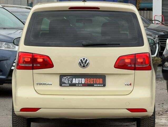 Желтый Фольксваген Туран, объемом двигателя 2 л и пробегом 262 тыс. км за 10800 $, фото 11 на Automoto.ua