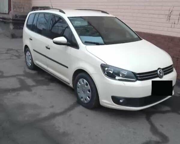 Желтый Фольксваген Туран, объемом двигателя 2 л и пробегом 320 тыс. км за 12500 $, фото 1 на Automoto.ua