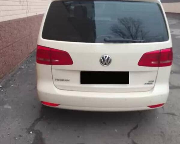Желтый Фольксваген Туран, объемом двигателя 2 л и пробегом 320 тыс. км за 12500 $, фото 8 на Automoto.ua