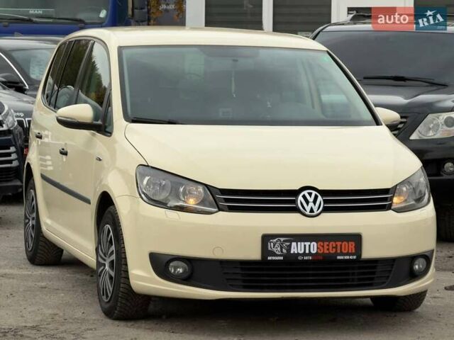 Желтый Фольксваген Туран, объемом двигателя 2 л и пробегом 262 тыс. км за 10800 $, фото 4 на Automoto.ua