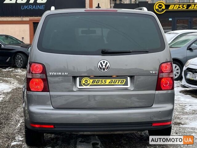 Серый Фольксваген Туран, объемом двигателя 1.4 л и пробегом 242 тыс. км за 7950 $, фото 4 на Automoto.ua