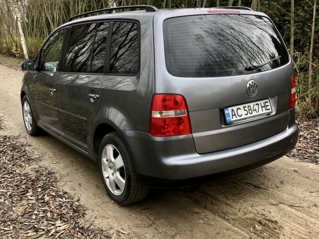 Серый Фольксваген Туран, объемом двигателя 1.9 л и пробегом 300 тыс. км за 5499 $, фото 4 на Automoto.ua