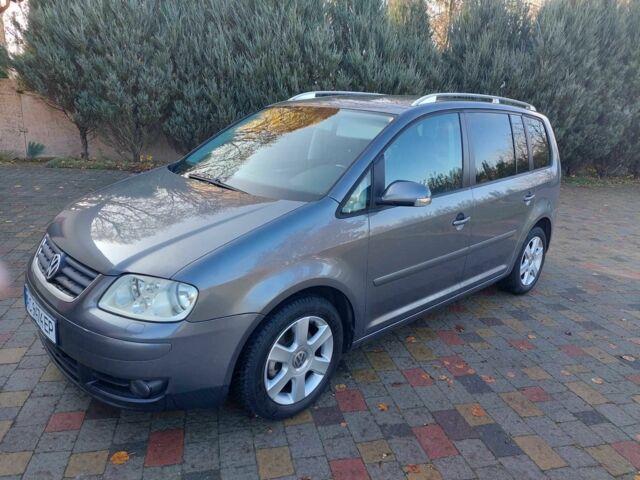 Сірий Фольксваген Туран, об'ємом двигуна 1.9 л та пробігом 185 тис. км за 7400 $, фото 1 на Automoto.ua
