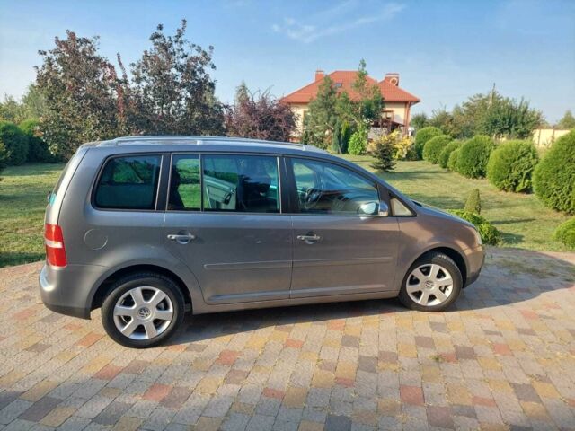 Сірий Фольксваген Туран, об'ємом двигуна 1.9 л та пробігом 185 тис. км за 7400 $, фото 2 на Automoto.ua