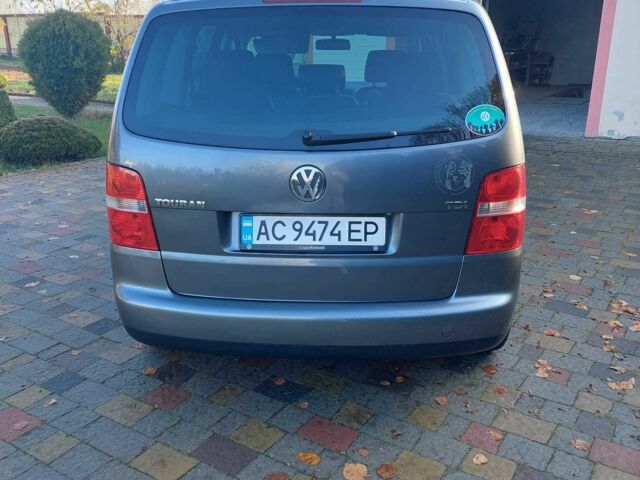 Сірий Фольксваген Туран, об'ємом двигуна 1.9 л та пробігом 185 тис. км за 7400 $, фото 3 на Automoto.ua