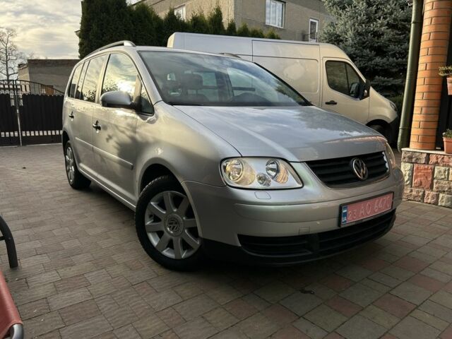 Серый Фольксваген Туран, объемом двигателя 1.6 л и пробегом 230 тыс. км за 5790 $, фото 1 на Automoto.ua