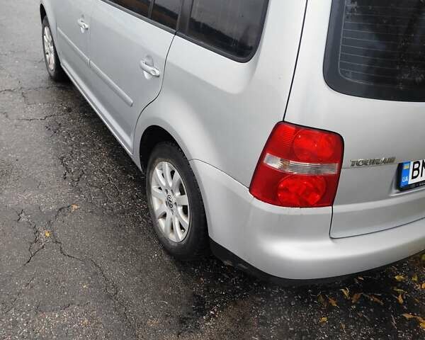 Серый Фольксваген Туран, объемом двигателя 1.6 л и пробегом 295 тыс. км за 5200 $, фото 1 на Automoto.ua