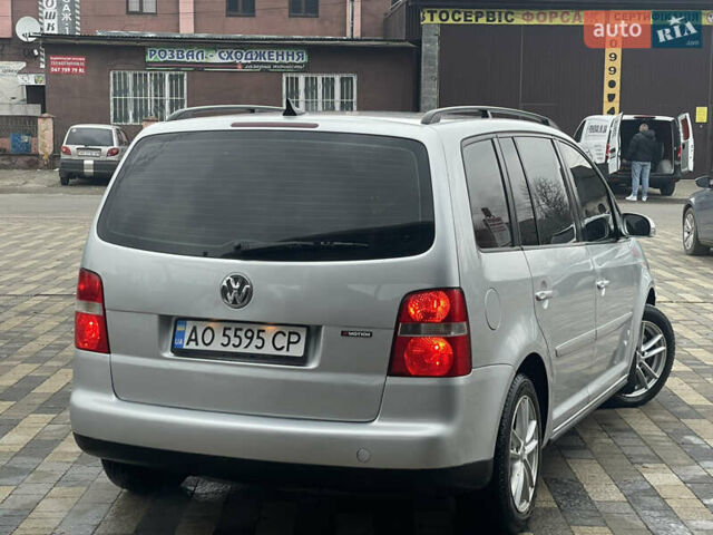 Серый Фольксваген Туран, объемом двигателя 1.9 л и пробегом 290 тыс. км за 4600 $, фото 4 на Automoto.ua