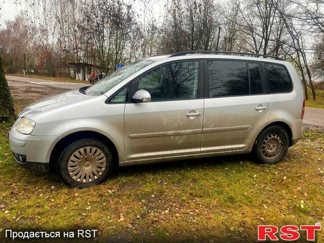 Серый Фольксваген Туран, объемом двигателя 1.9 л и пробегом 365 тыс. км за 5500 $, фото 2 на Automoto.ua