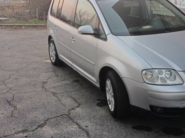 Серый Фольксваген Туран, объемом двигателя 1.6 л и пробегом 210 тыс. км за 4500 $, фото 13 на Automoto.ua