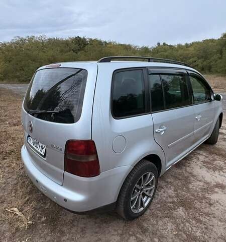 Серый Фольксваген Туран, объемом двигателя 1.6 л и пробегом 291 тыс. км за 5000 $, фото 11 на Automoto.ua