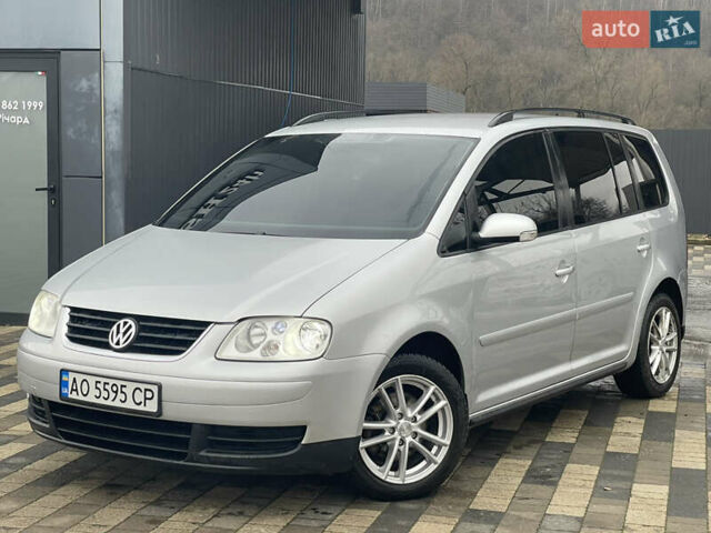 Серый Фольксваген Туран, объемом двигателя 1.9 л и пробегом 290 тыс. км за 4600 $, фото 1 на Automoto.ua