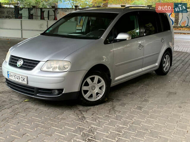 Серый Фольксваген Туран, объемом двигателя 2 л и пробегом 298 тыс. км за 6750 $, фото 1 на Automoto.ua