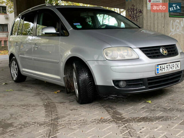 Серый Фольксваген Туран, объемом двигателя 2 л и пробегом 298 тыс. км за 6750 $, фото 2 на Automoto.ua