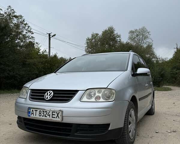 Серый Фольксваген Туран, объемом двигателя 1.9 л и пробегом 353 тыс. км за 5305 $, фото 1 на Automoto.ua
