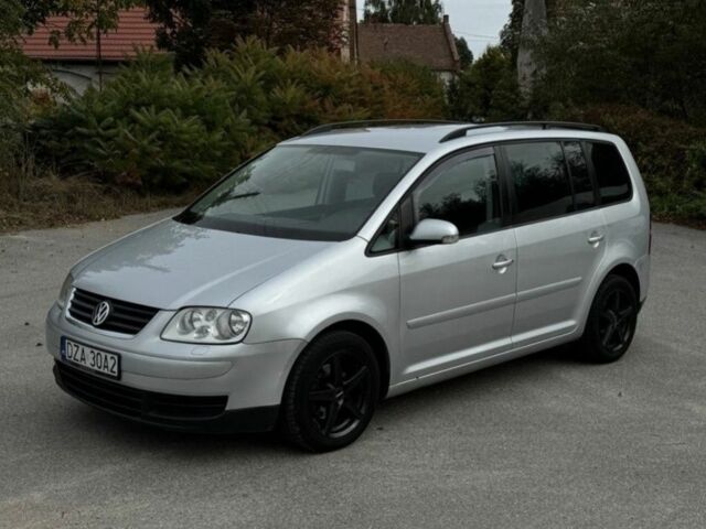 Серый Фольксваген Туран, объемом двигателя 1.9 л и пробегом 277 тыс. км за 1546 $, фото 2 на Automoto.ua